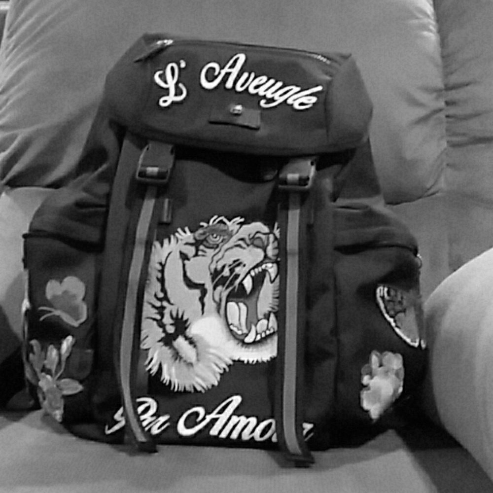 Gucci love is blind embroidered tiger backpack